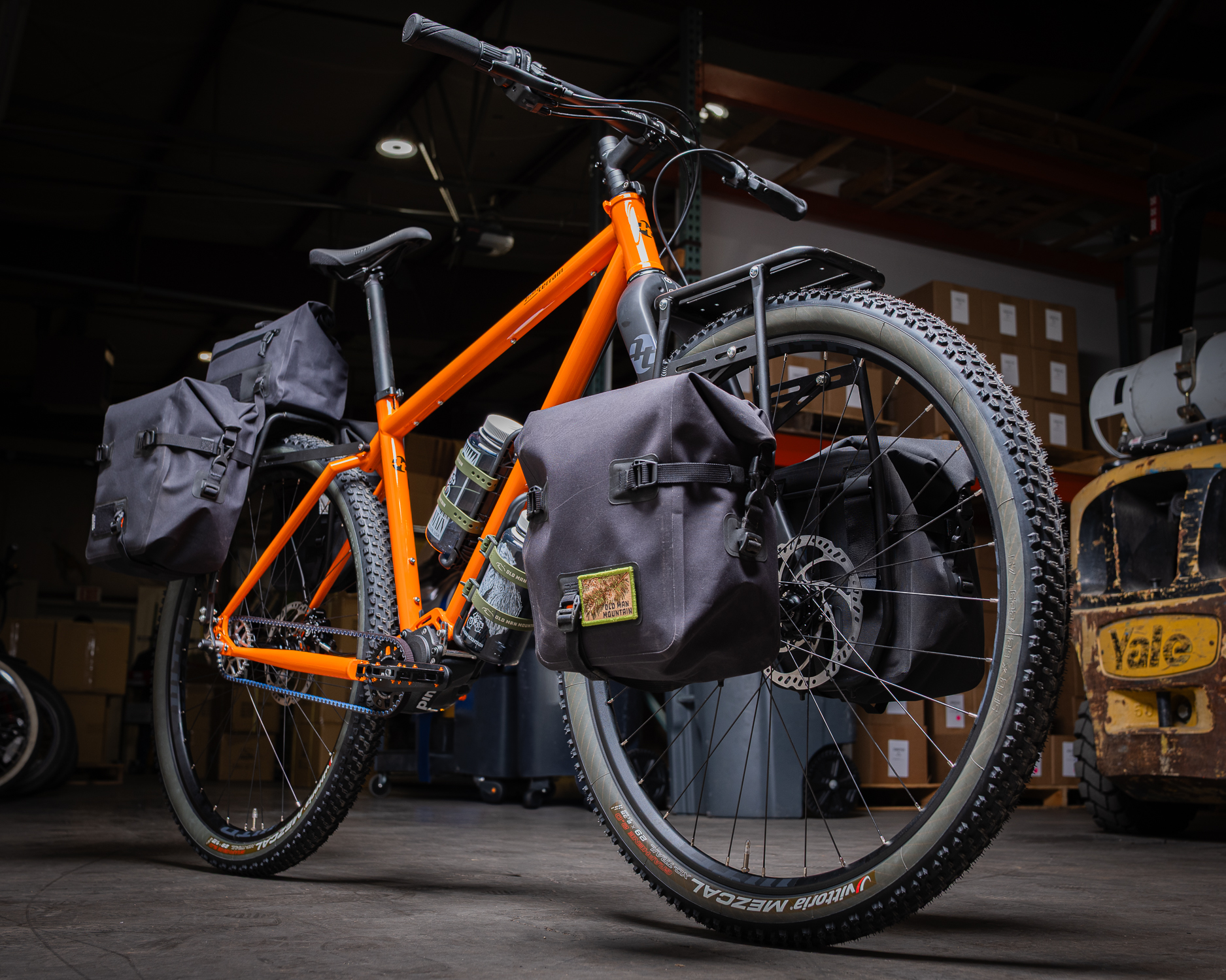 Bike with Old Man Mountain racks and panniers in warehouse